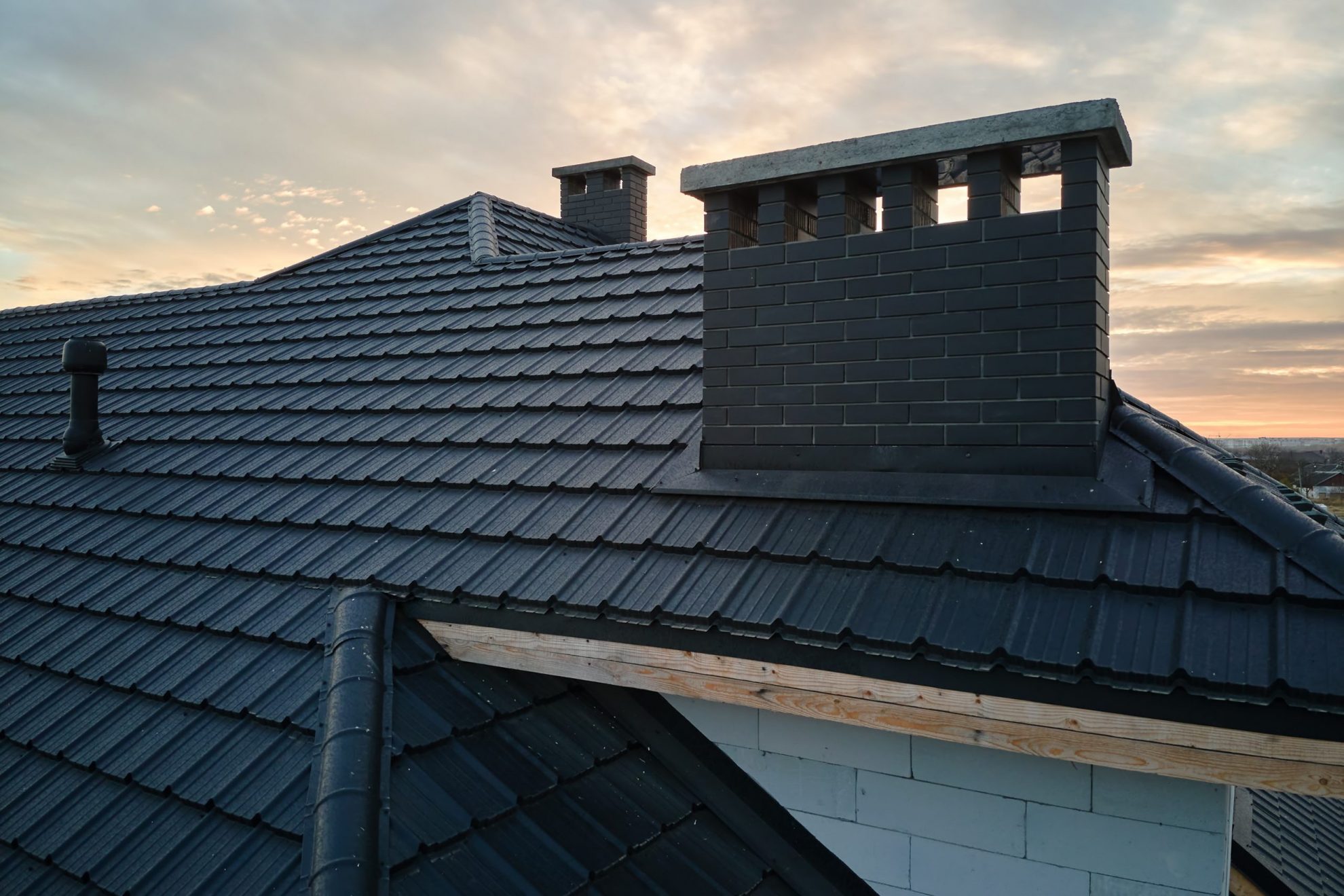Closeup of roof illustrates blog "5 Summer Roof Maintenance Tips"