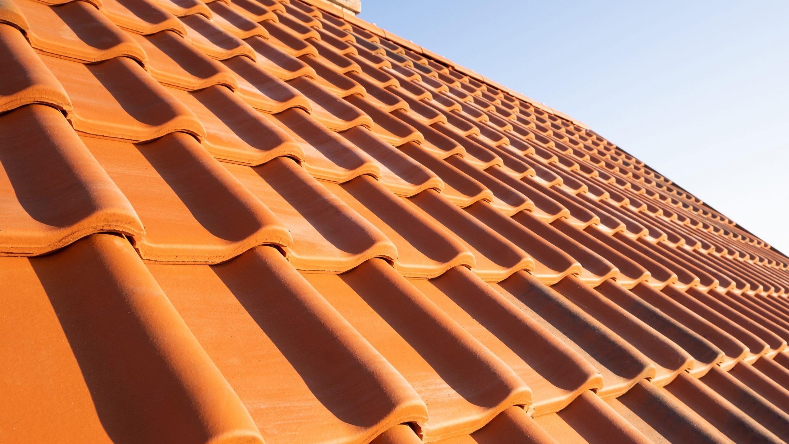 Closeup of roof shingles illustrates blog "What Is Roofing Underlayment? "