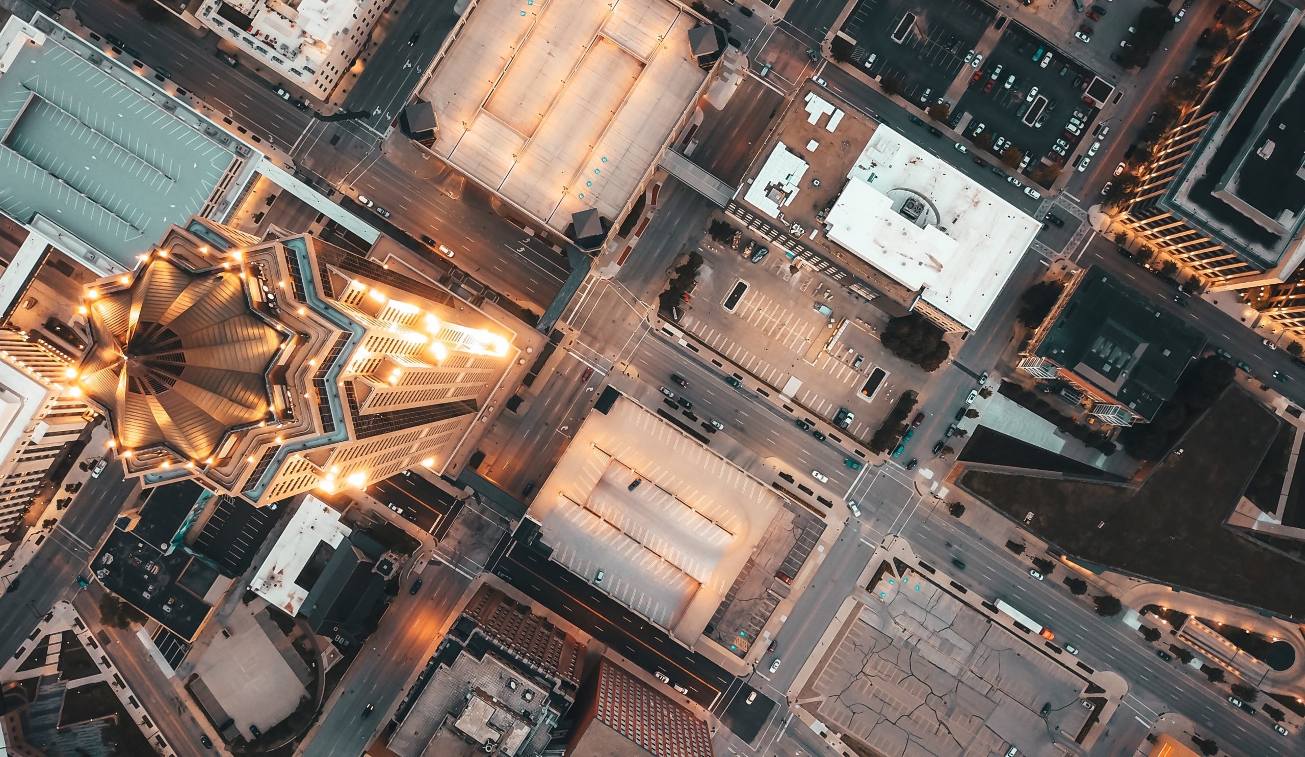 Aerial view of city illustrates blog "Residential vs Commercial Roofing: What Is the Difference?"