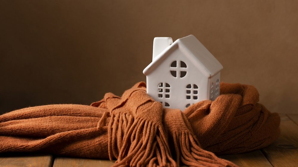 home-scarf-feepik Toy house with a scarf wrapped around it illustrates blog