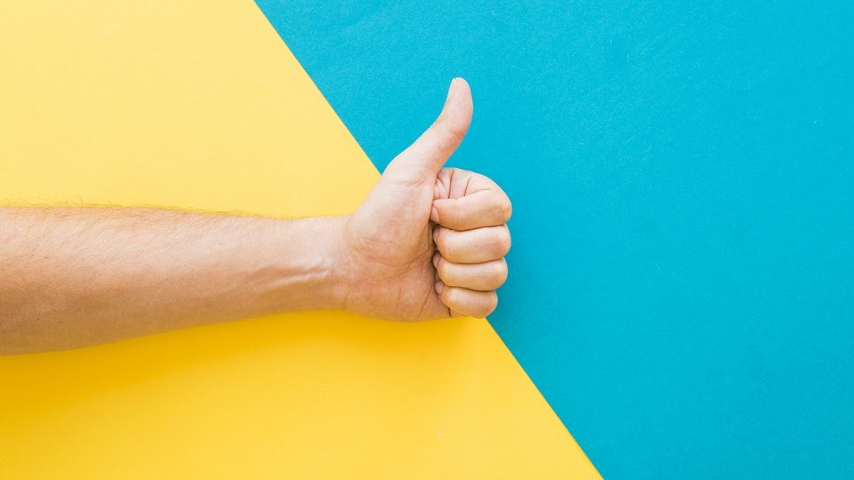 Closeup of hand giving thumbs up illustrates blog "Common Roofing Problems and How to Solve Themv"