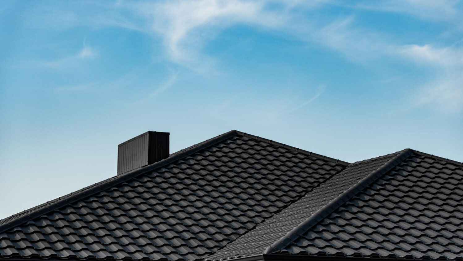 Cool roof coatings on a California home roof reflecting sunlight